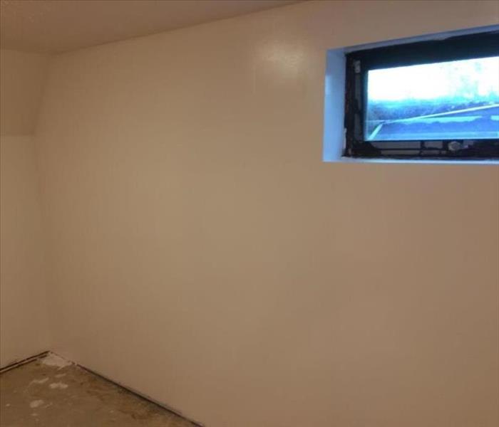 A completely rebuilt wall with a fresh coat of paint